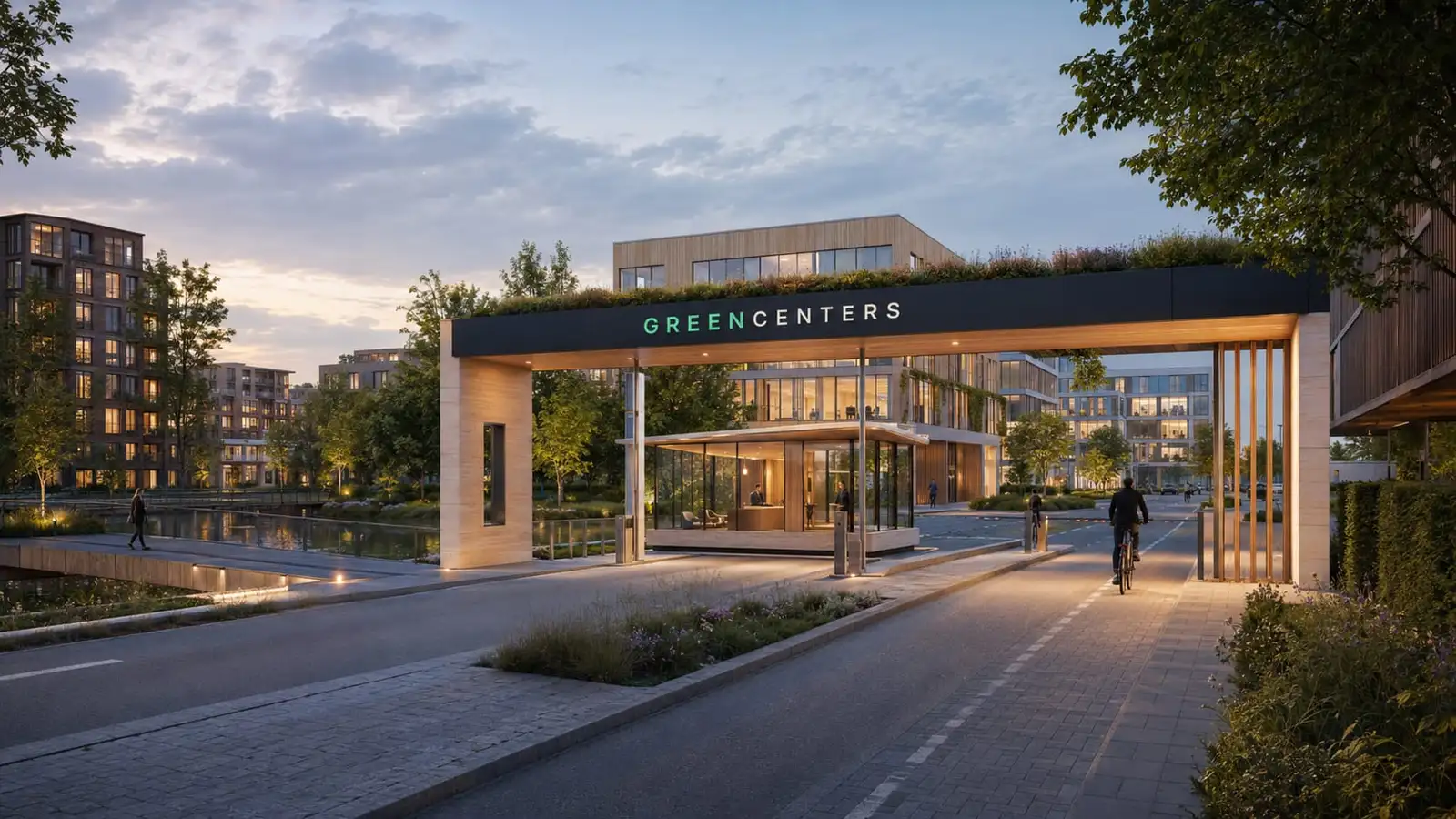 Dusk render of an entrance gateway carrying the GreenCenters wordmark, with timber-and-glass buildings, water and planting beyond